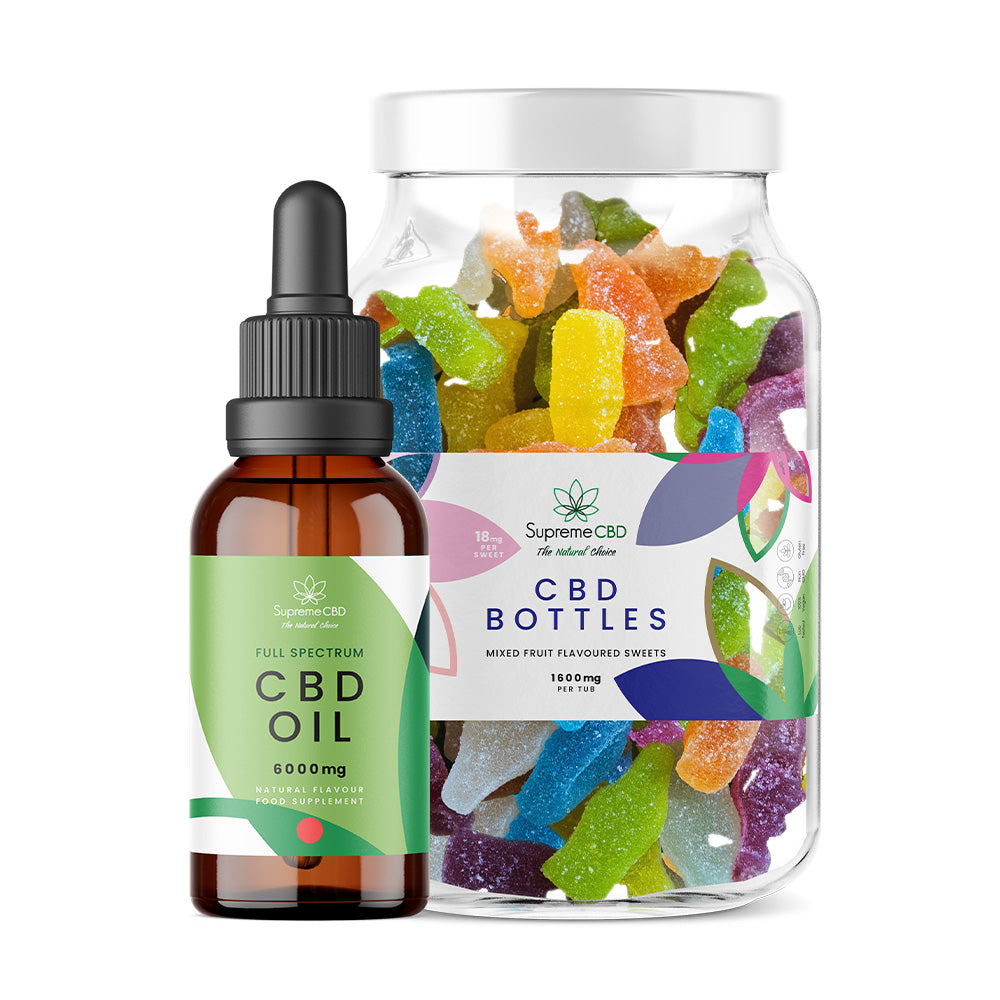 CBD oil dropper and jar of CBD gummies on a white background