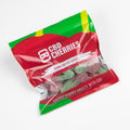 Packaged CBD gummy cherries with red and green design on a white background