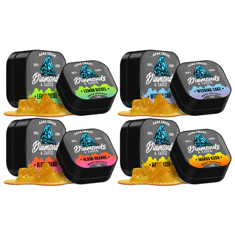Assorted tins of 'Diamonds & Sauce' with colorful labels on a white background