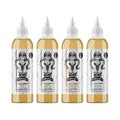 Four bottles of Dope Goat Deluxe on a white background