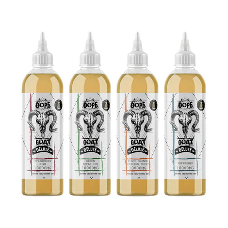 Four bottles of Dope Goat Deluxe on a white background