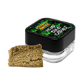 Jar of cannabis extract with a piece of cannabis on a white background