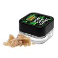Jar of cannabis resin with a black lid featuring branding on a white background