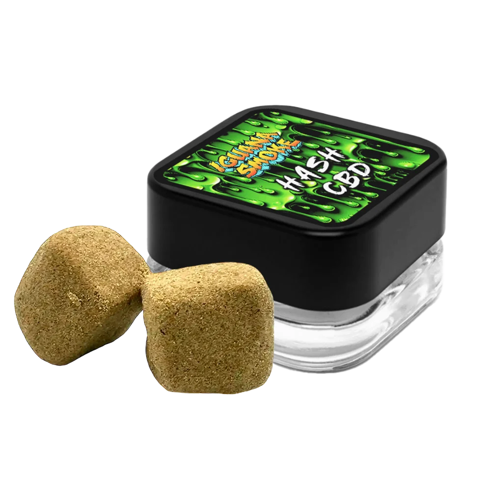 Black container with green label featuring 'Hash CBD' and two beige固体块状物 on a white background