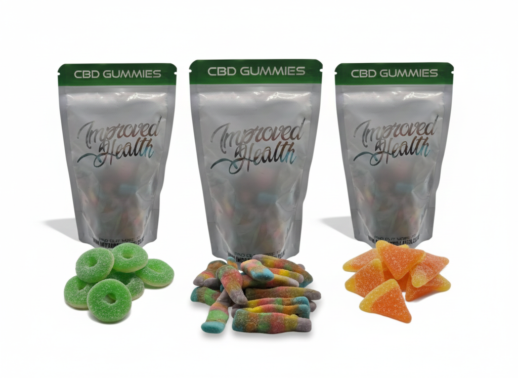 Three bags of CBD Gummies labeled 'Improved Health' with gummy candies in front.