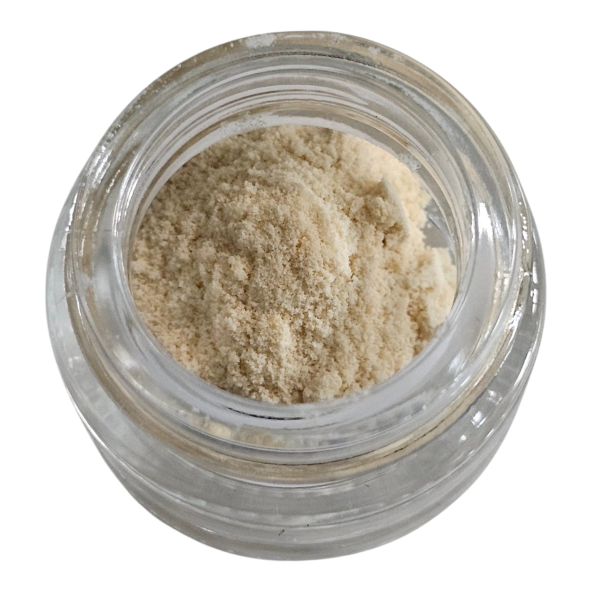 Clear glass jar filled with beige powder on a white background