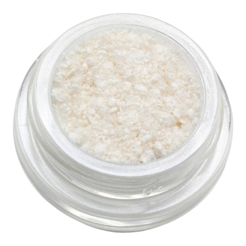 Small clear container filled with white granular substance on a white background